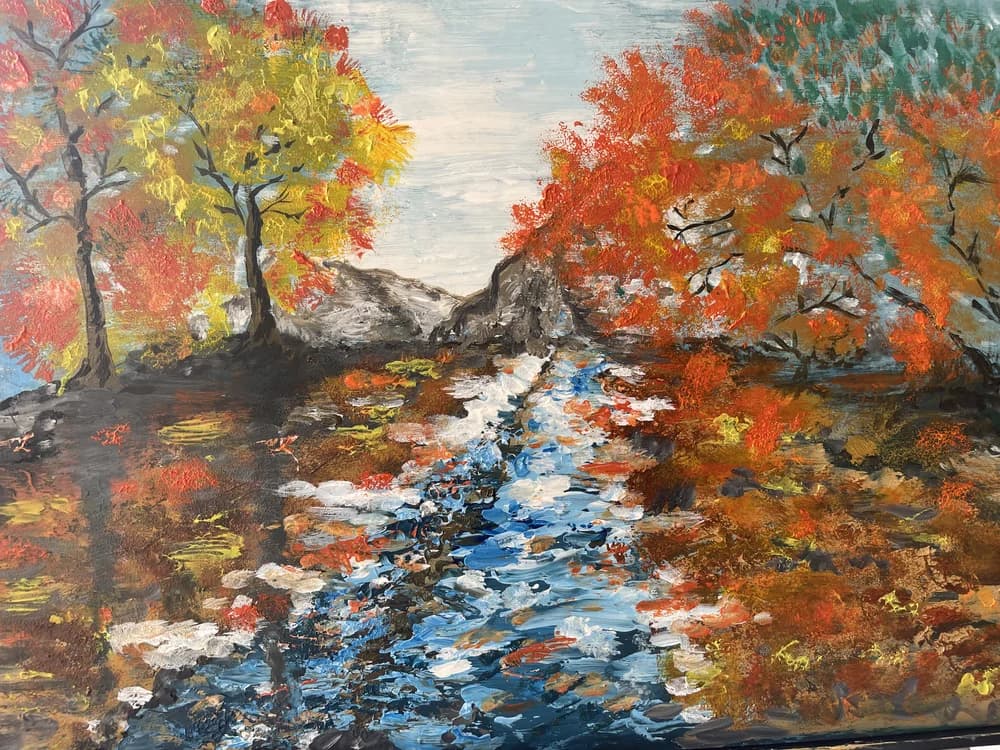 Painting of a stream flowing through brilliant orange and red autumn trees in the Catskill Mountains