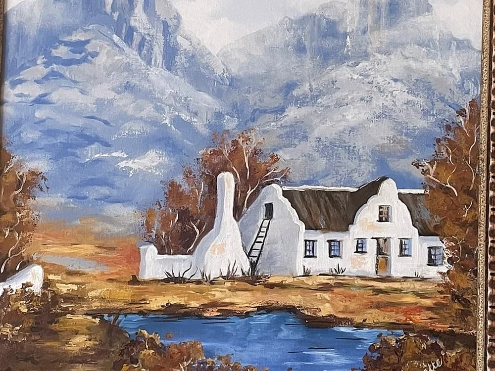 Painting of white Cape Dutch homestead reflected in blue dam with autumn trees and mountains